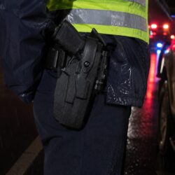 Safariland 7360 7TS light-bearing duty holster in the rain on a night traffic stop
