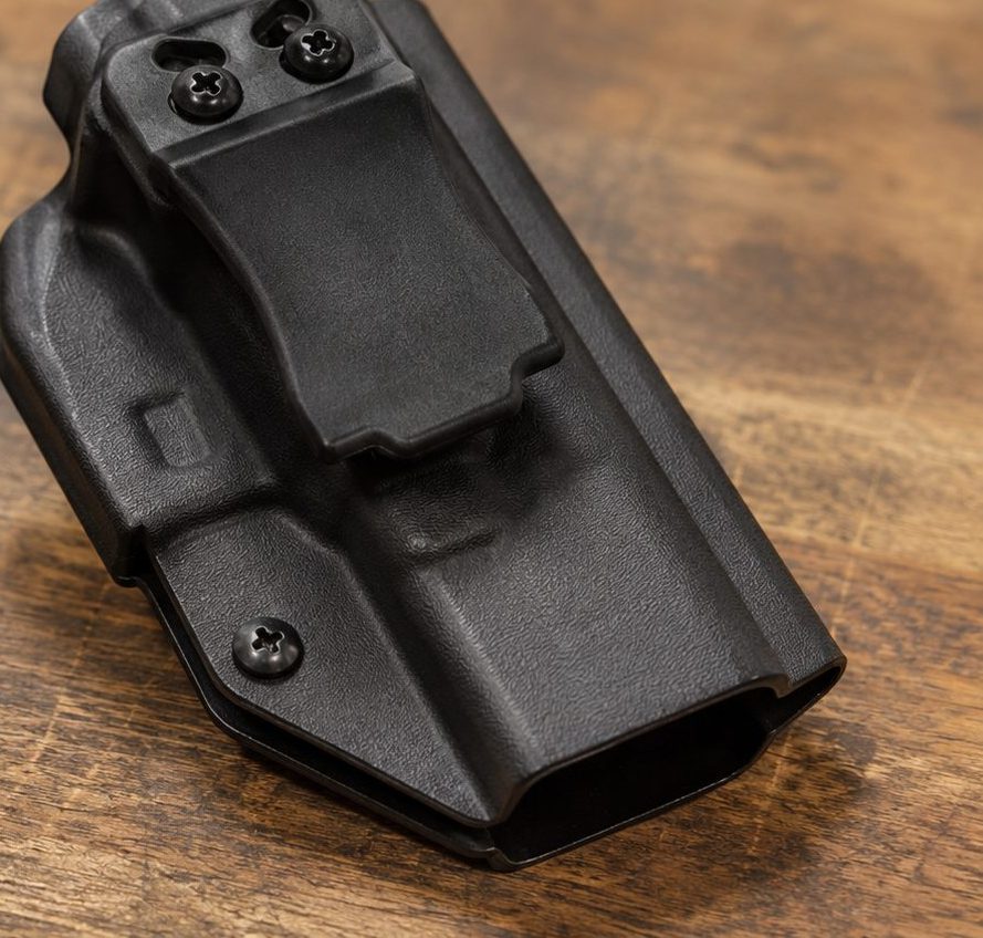Black Kydex We The People IWB shell showing the molded Glock 19 fit and weapon-light channel